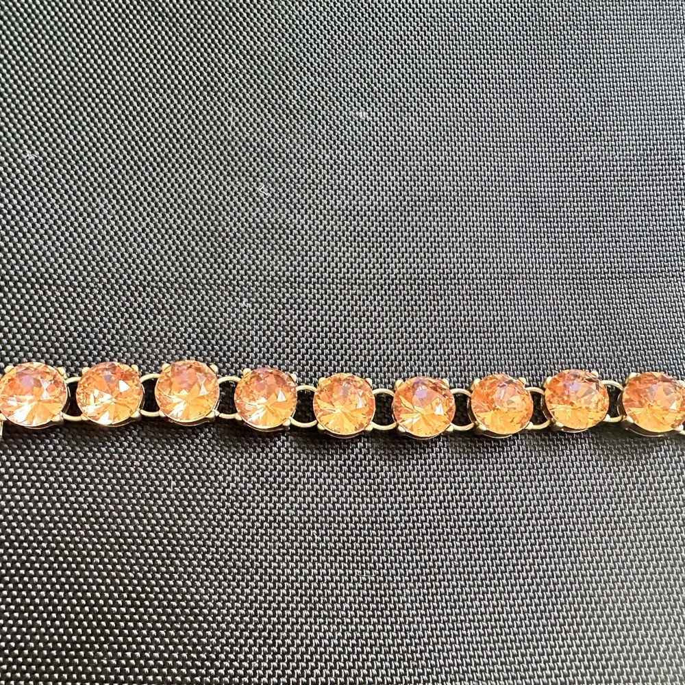 Elegant Gold and Orange Bracelet